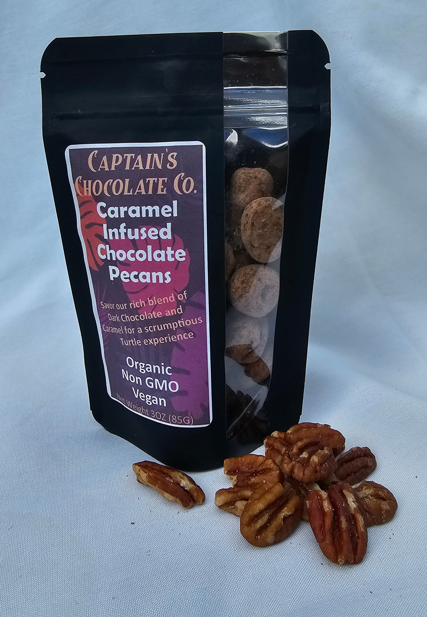 
                  
                    Caramel Infused Chocolate Pecans
                  
                